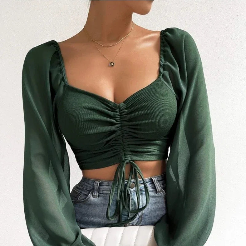 Maglietta donna  Maglietta sexy da donna con maniche a lanterna in rete e coulisse, con petto nudo e ombelico, maniche lunghe
