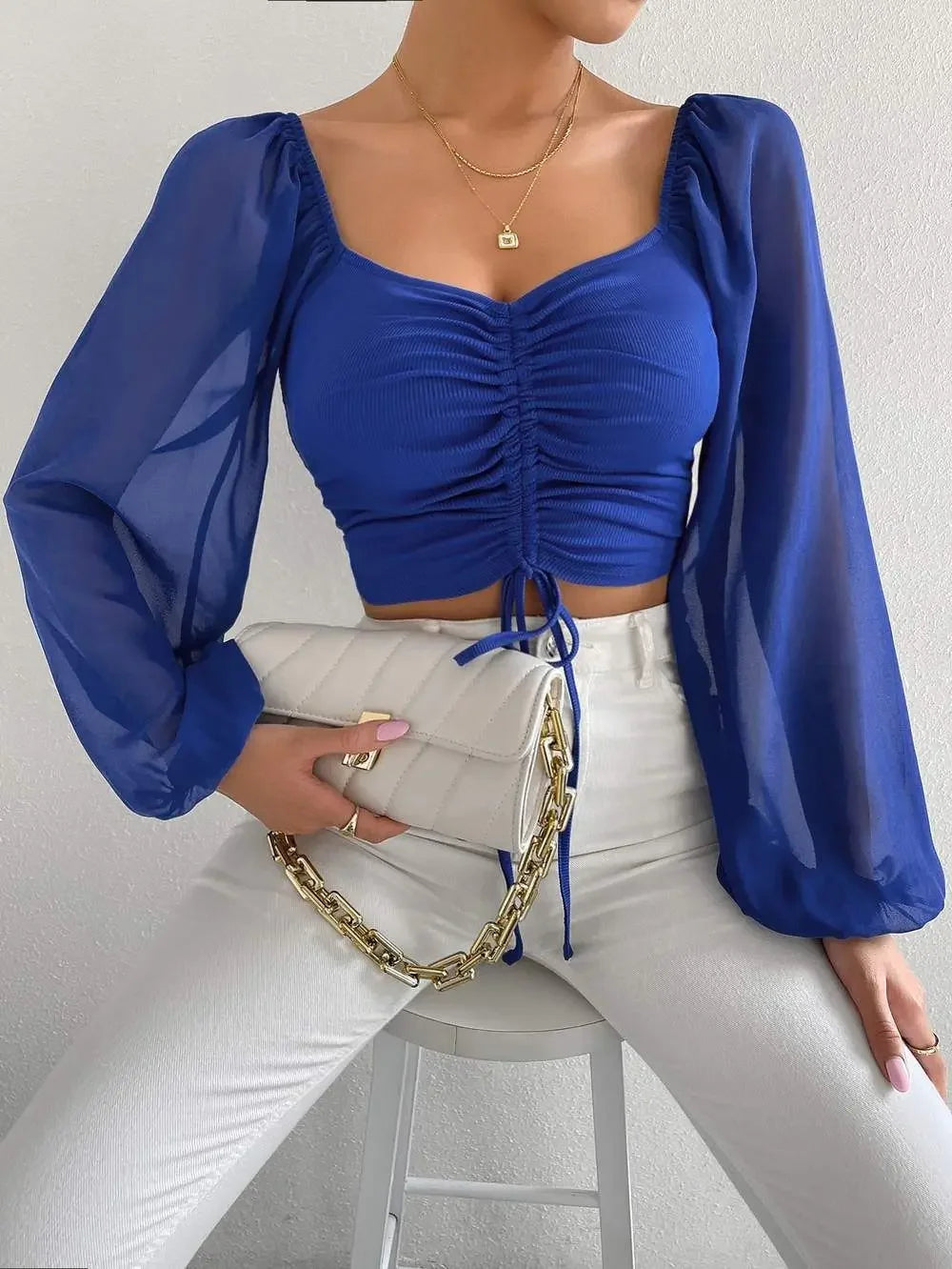 Maglietta donna  Maglietta sexy da donna con maniche a lanterna in rete e coulisse, con petto nudo e ombelico, maniche lunghe