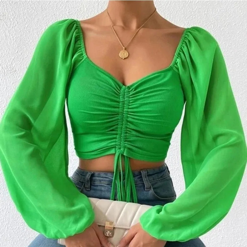 Maglietta donna  Maglietta sexy da donna con maniche a lanterna in rete e coulisse, con petto nudo e ombelico, maniche lunghe